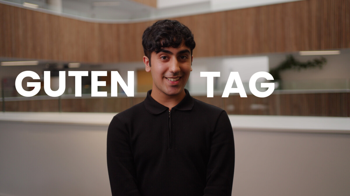 A MFL Mentor looks down the camera with the words 'Guten Tag' written on screen, German for 'Good Day'